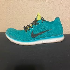 Men’s Nike free rn fly knit teal and volt size 10.5